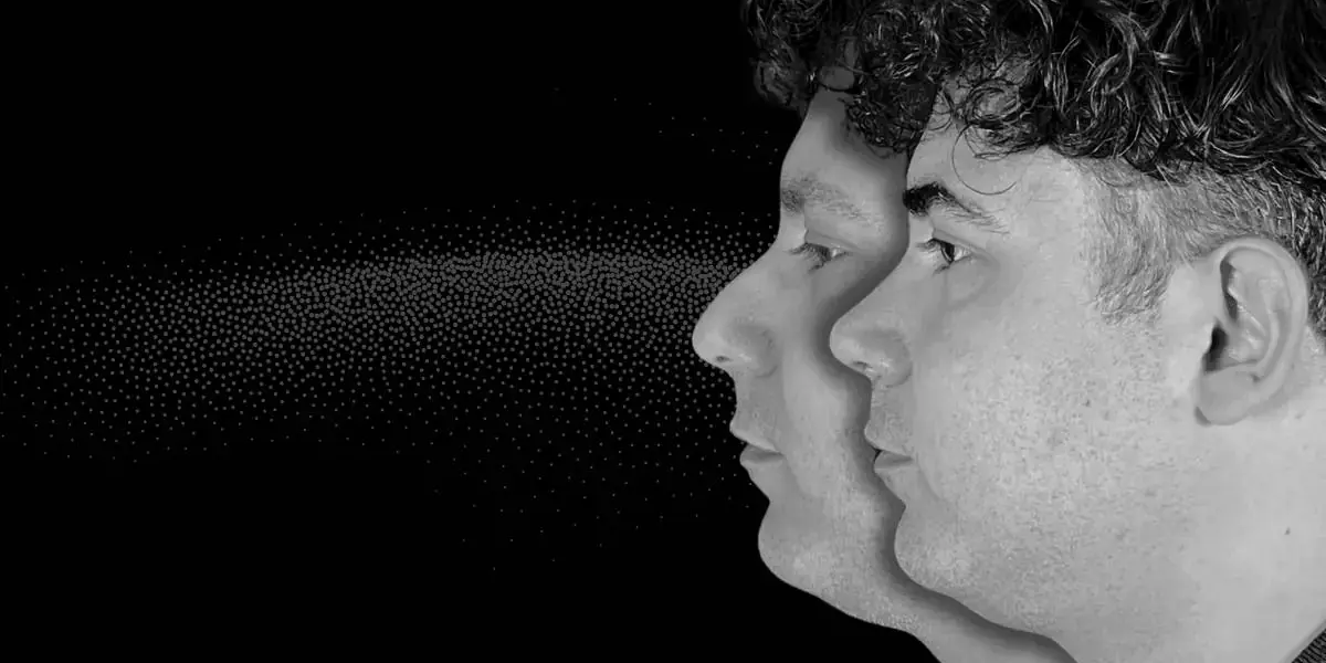 Two profiles of the same man, with a line of particles showing airflow from the nose